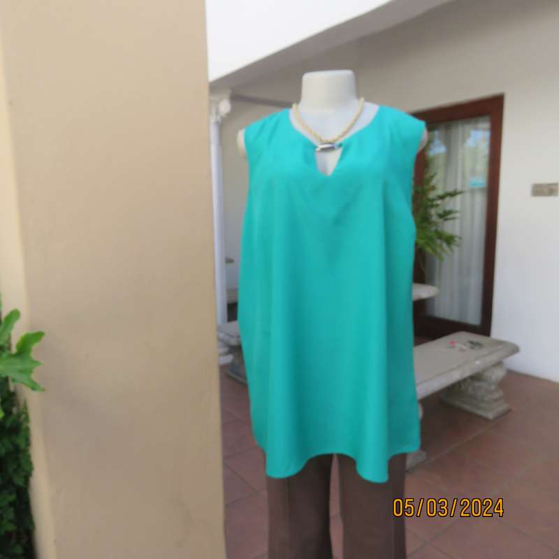 FASHION EXPRESS size 46 emerald green slip over sleeveless top. Round neck with short V-buckle