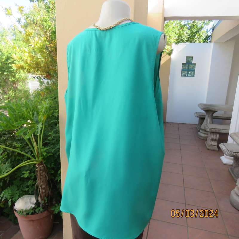FASHION EXPRESS size 46 emerald green slip over sleeveless top. Round neck with short V-buckle