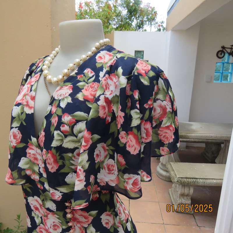 Top of the line sheer polyester navy/crimson/green floral  dress. Amazing wide collar.Size 38.As new