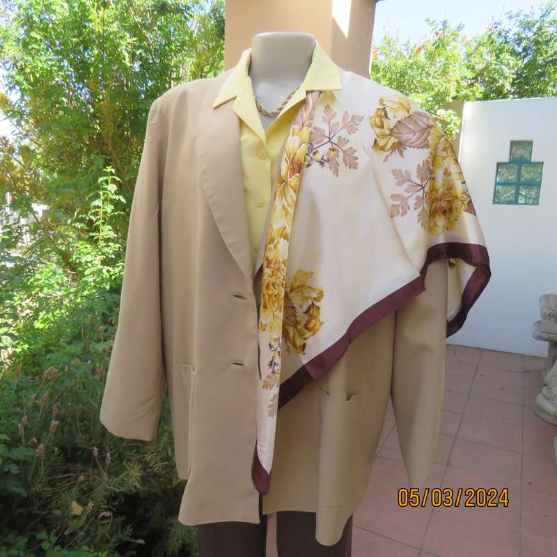Smart granola colour long sleeve fully lined jacket. Size 44 to 46. Lapel collar. Two button closure