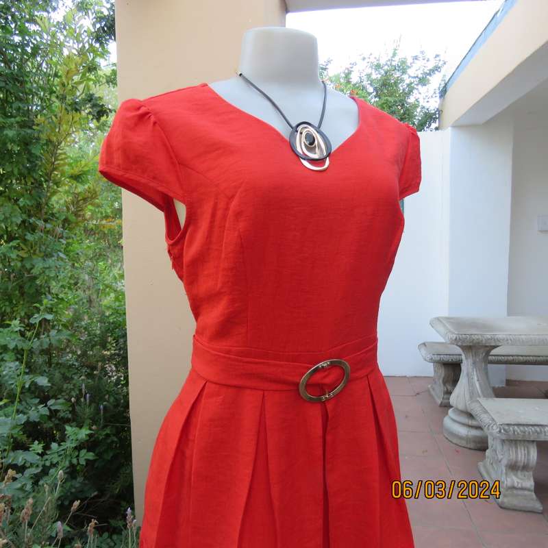 MIGEER poly-rayon red fully lined dress. Size 36. Short pleated bottom. V neck top. Capped sleeves