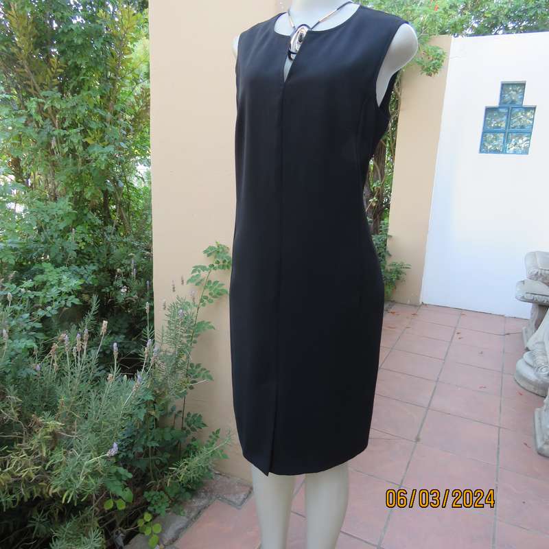 Elegant WOOLWORTHS black fully lined sheath polyester sleeveless dress. Size 38. As new condition.