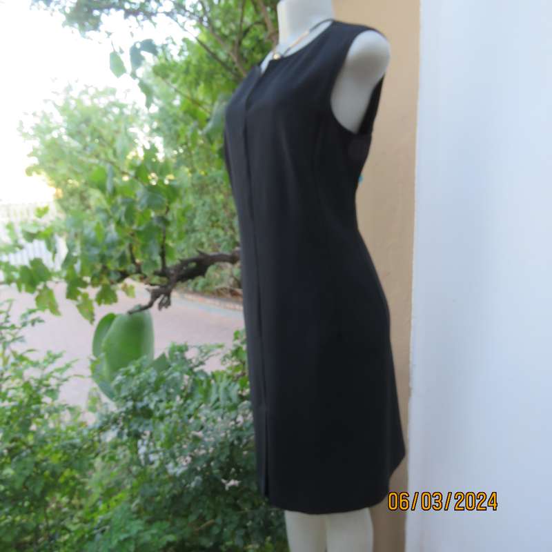 Elegant WOOLWORTHS black fully lined sheath polyester sleeveless dress. Size 38. As new condition.