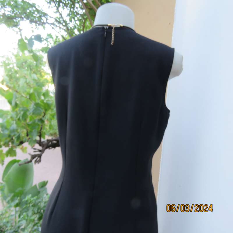 Elegant WOOLWORTHS black fully lined sheath polyester sleeveless dress. Size 38. As new condition.