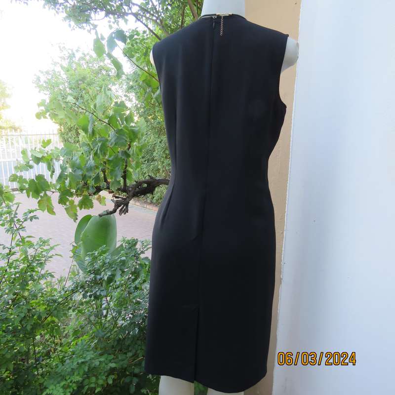 Elegant WOOLWORTHS black fully lined sheath polyester sleeveless dress. Size 38. As new condition.