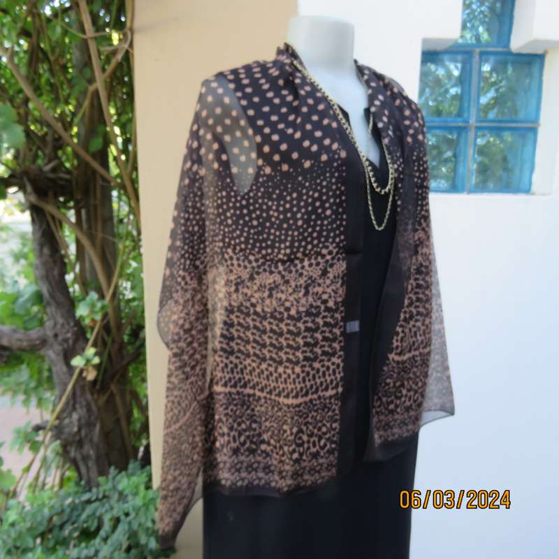Elegant black sheer polyester scarf with small granola patterns and beautiful borders. 150cm x 50cm.