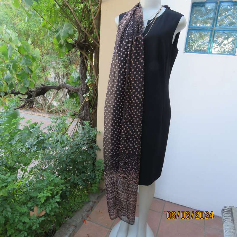 Elegant black sheer polyester scarf with small granola patterns and beautiful borders. 150cm x 50cm.