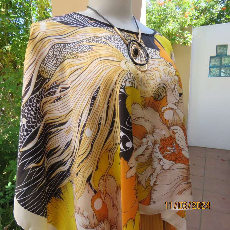 Striking autumn colour throw in silky polyester. Free size. New item