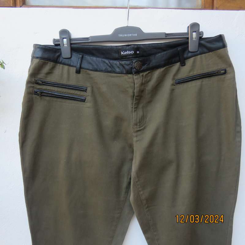 KELSO dark olive green skinny pants size 42 with black faux leather waistband.