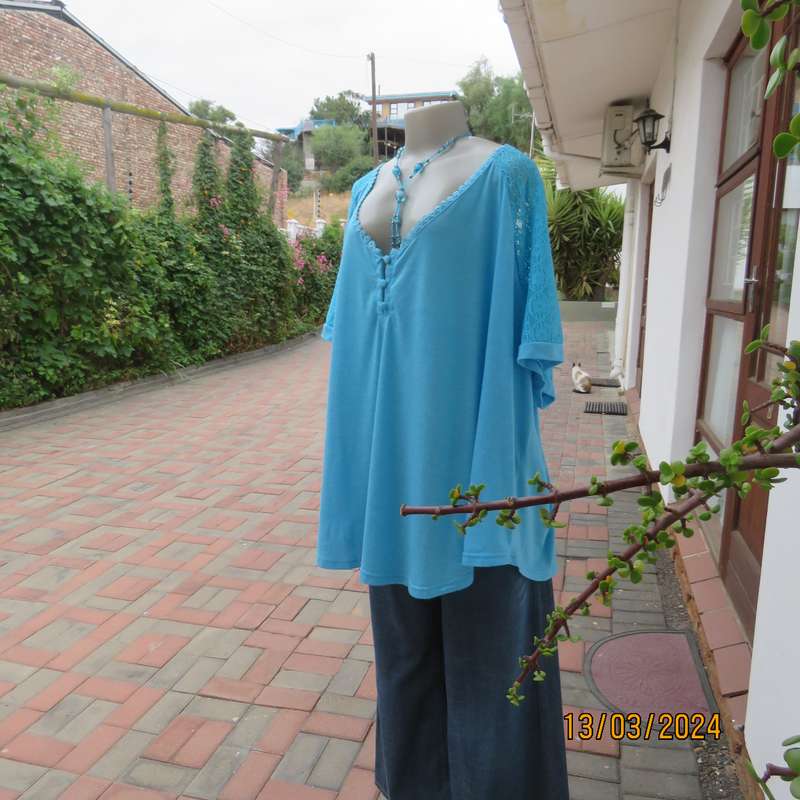 SHEIN turquoise short lace sleeve top size 56. Poly-viscose stretch. As new