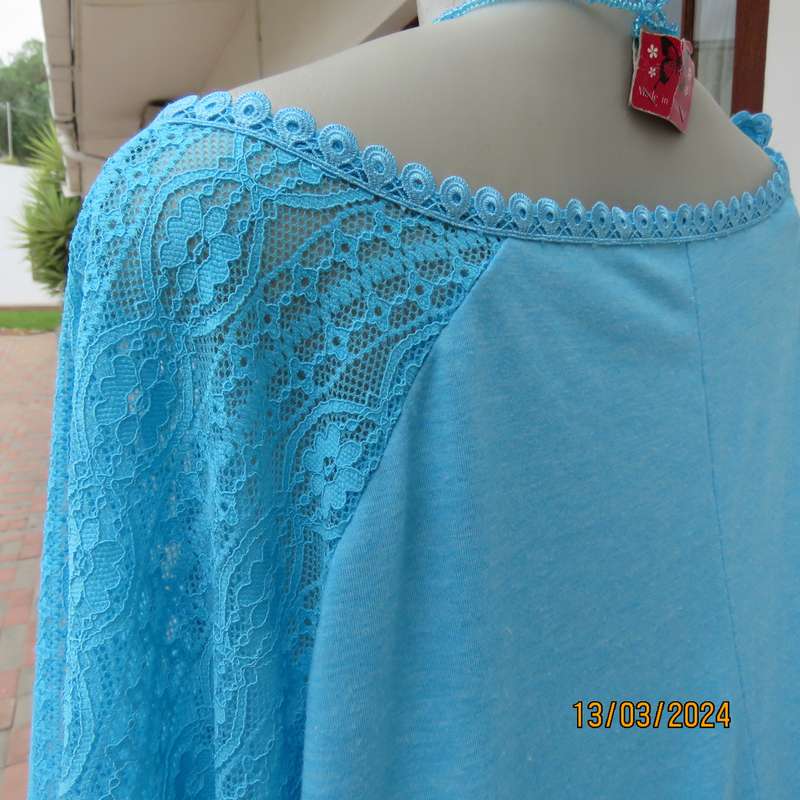 SHEIN turquoise short lace sleeve top size 56. Poly-viscose stretch. As new