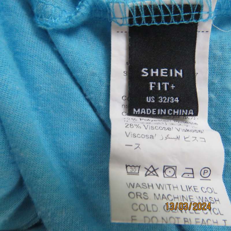 SHEIN turquoise short lace sleeve top size 56. Poly-viscose stretch. As new
