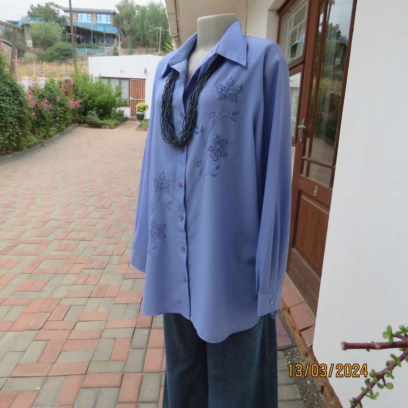 Steel blue richly embroidered long sleeve blouse by CG Collection New York. Size 42