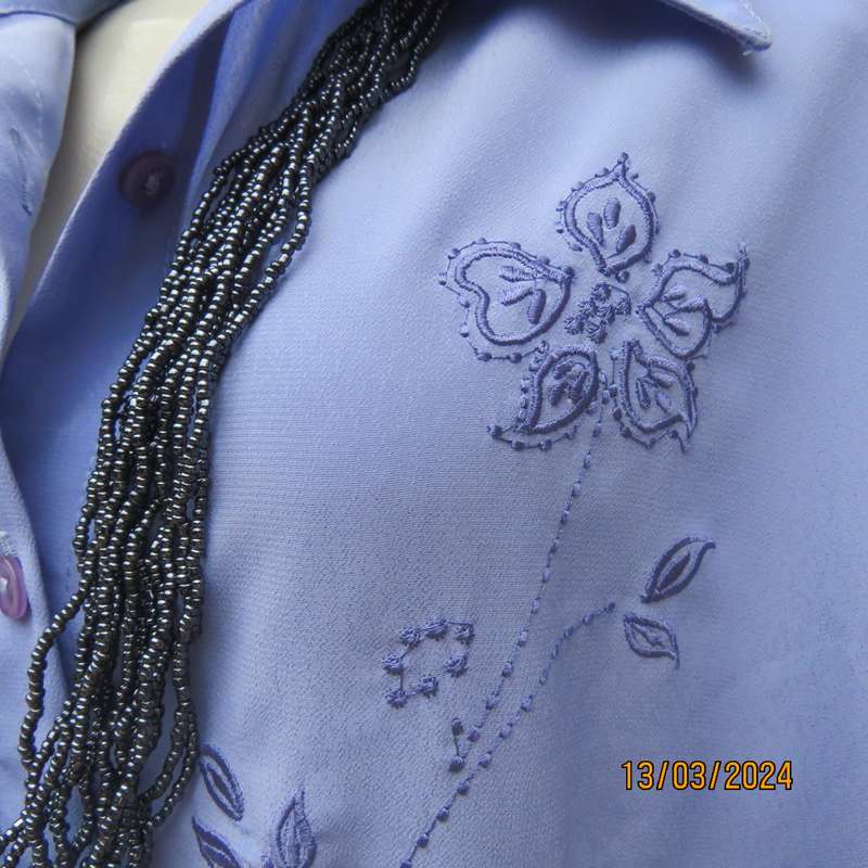 Steel blue richly embroidered long sleeve blouse by CG Collection New York. Size 42