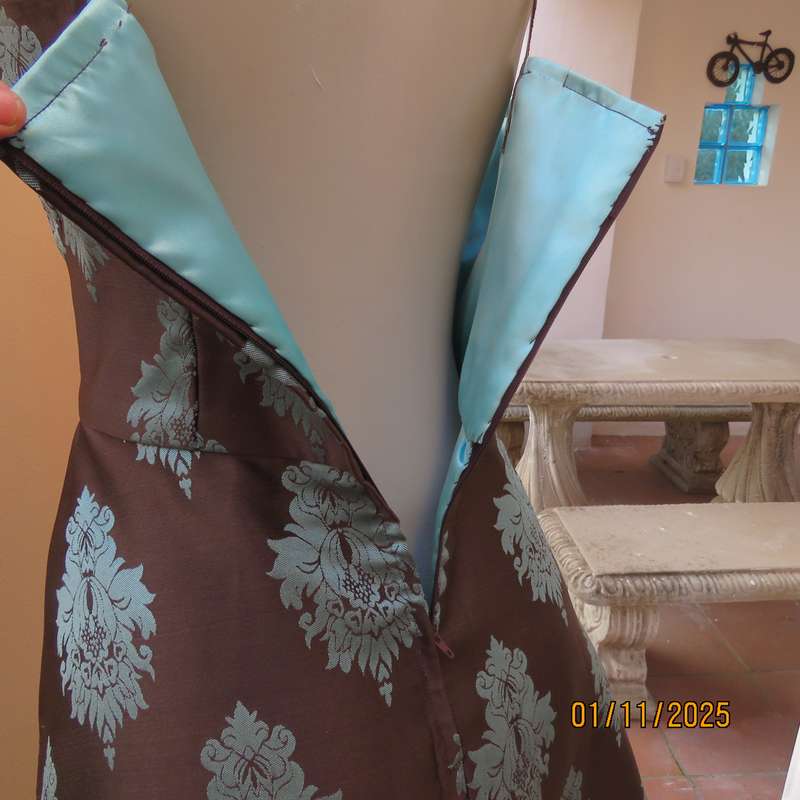 BOUTIQUE made brown brocade dress with light turquoise baroque design and underlayer.Size 36.As new