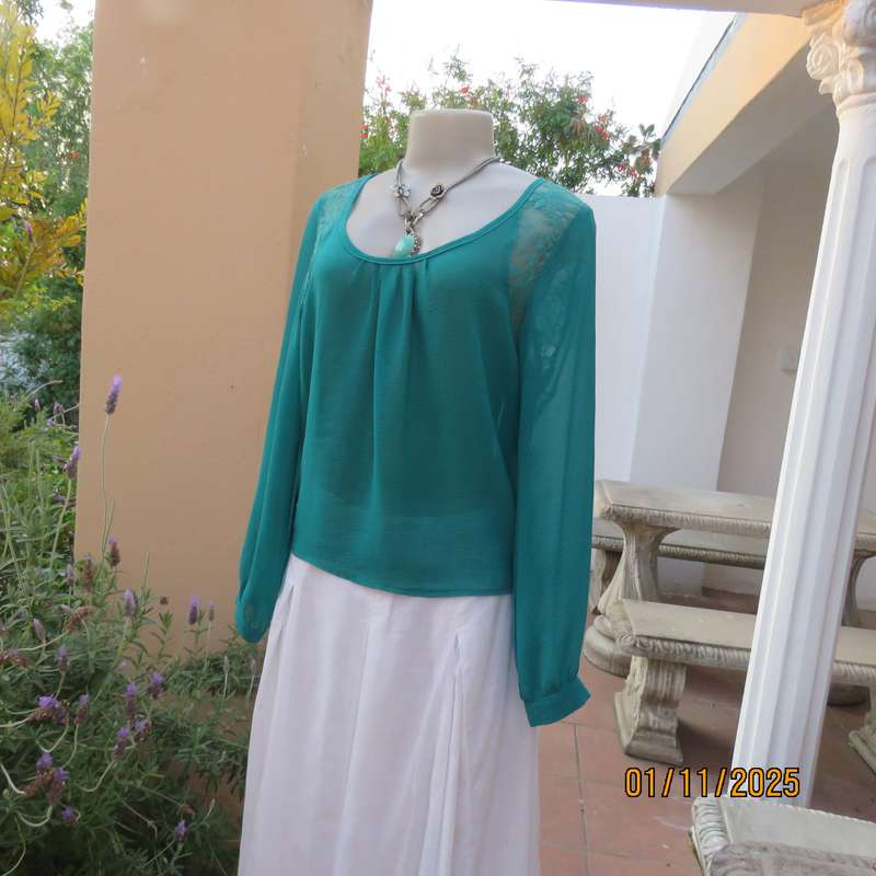 SUPERSTAR jade colour polyester long cuffed sleeve top. With acrylic lace inlays. Size 35-11. As new