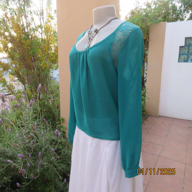 SUPERSTAR jade colour polyester long cuffed sleeve top. With acrylic lace inlays. Size 35-11. As new