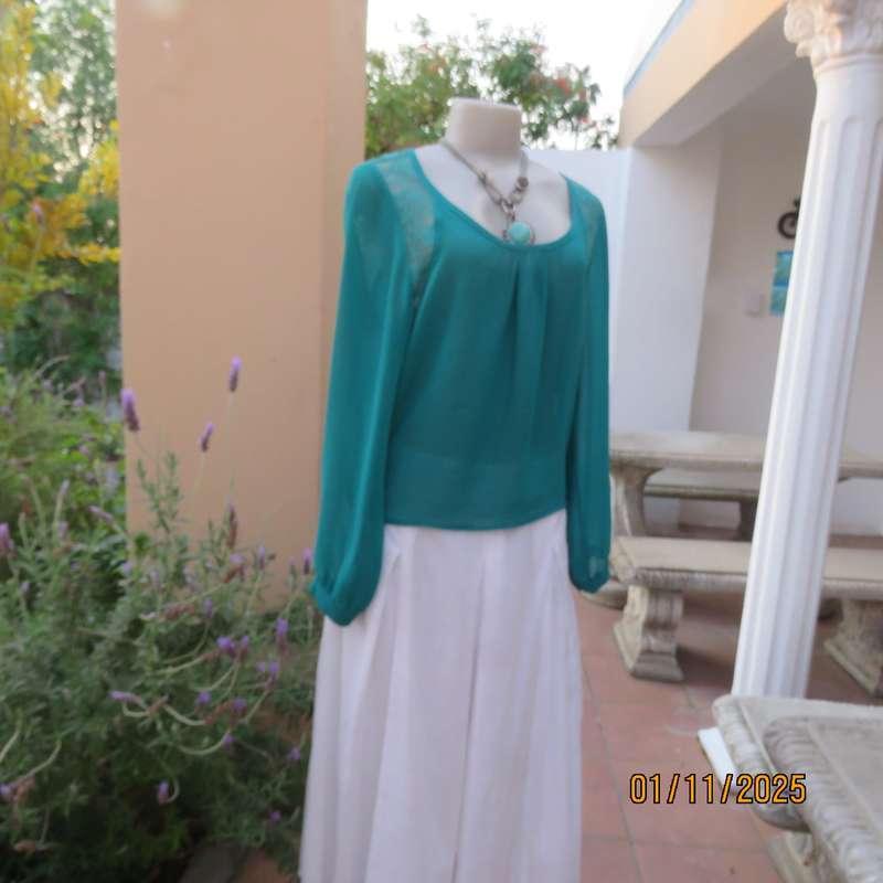 SUPERSTAR jade colour polyester long cuffed sleeve top. With acrylic lace inlays. Size 35-11. As new
