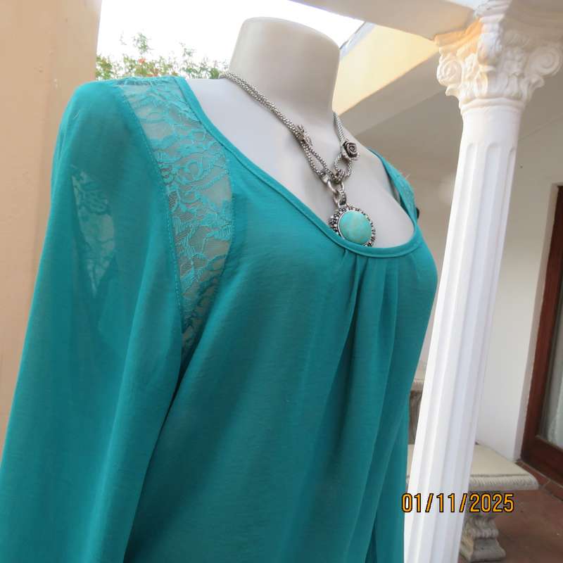 SUPERSTAR jade colour polyester long cuffed sleeve top. With acrylic lace inlays. Size 35-11. As new
