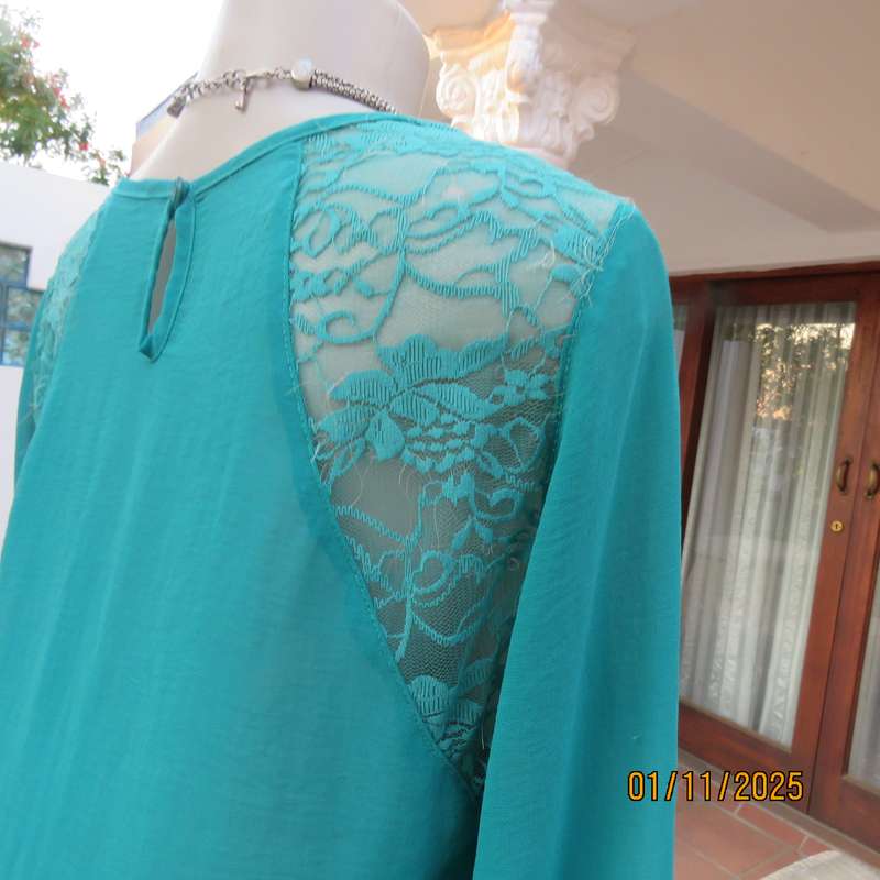 SUPERSTAR jade colour polyester long cuffed sleeve top. With acrylic lace inlays. Size 35-11. As new