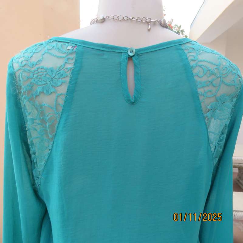 SUPERSTAR jade colour polyester long cuffed sleeve top. With acrylic lace inlays. Size 35-11. As new