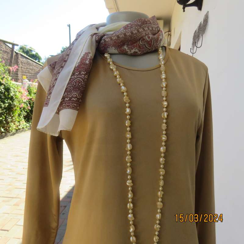 MENGSI gold colour stretch lycra long sleeve slip over top size 36. As new condition.