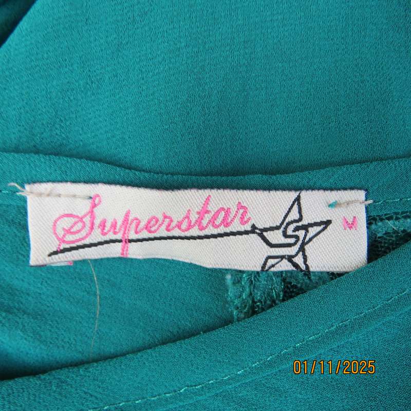 SUPERSTAR jade colour polyester long cuffed sleeve top. With acrylic lace inlays. Size 35-11. As new