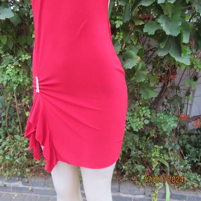 Red polyester stretch evening short dress size 34. Decorated. Long straps to tie.
