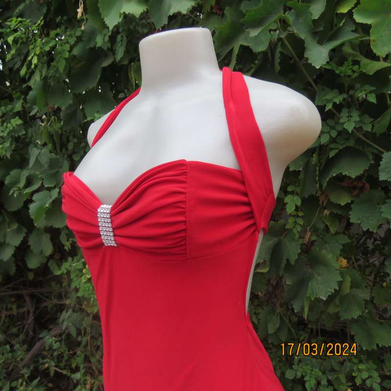 Red polyester stretch evening short dress size 34. Decorated. Long straps to tie.