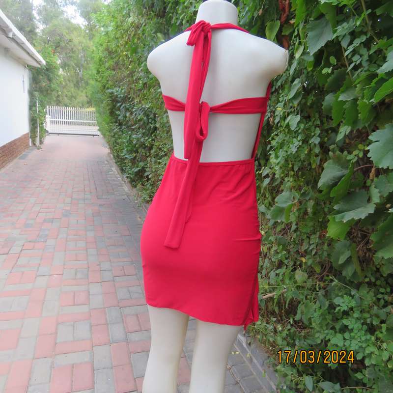 Red polyester stretch evening short dress size 34. Decorated. Long straps to tie.