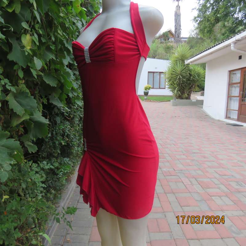 Red polyester stretch evening short dress size 34. Decorated. Long straps to tie.