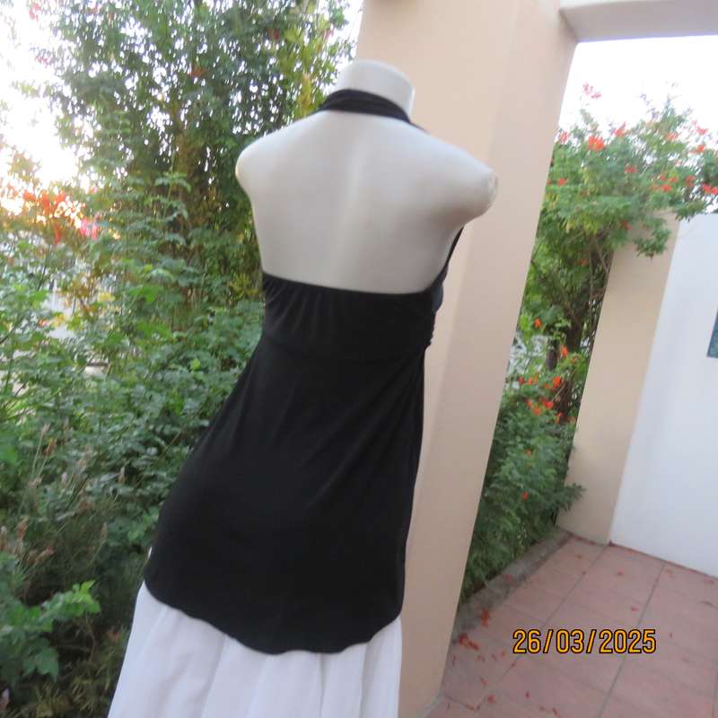 Very black stretch polyester halter neck evening top. Gathered front band with buckle. Size 30