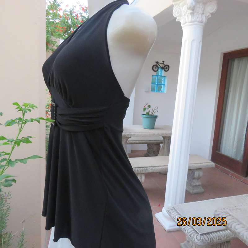 Very black stretch polyester halter neck evening top. Gathered front band with buckle. Size 30