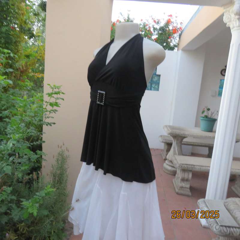Very black stretch polyester halter neck evening top. Gathered front band with buckle. Size 30
