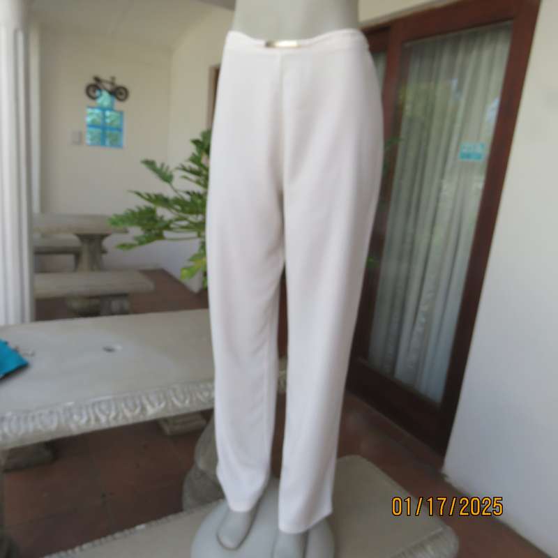 Amazing light cream dress pants with straight legs size 34. Narrow waistband. Zip at back. As new