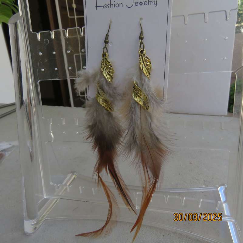Extra long brownish feather and gold ethnic earrings. New item.