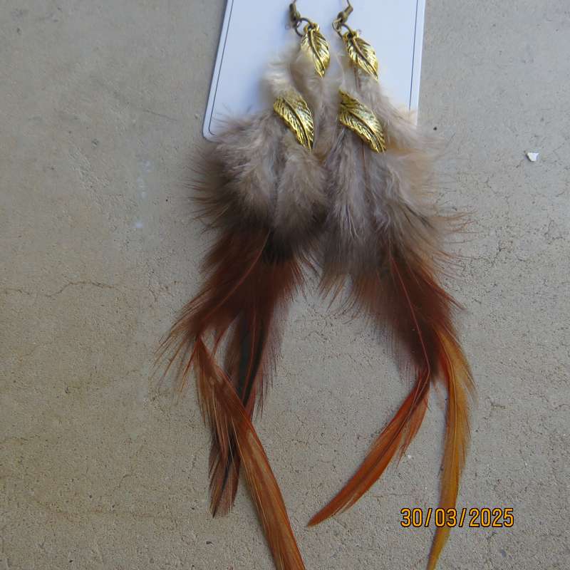 Extra long brownish feather and gold ethnic earrings. New item.