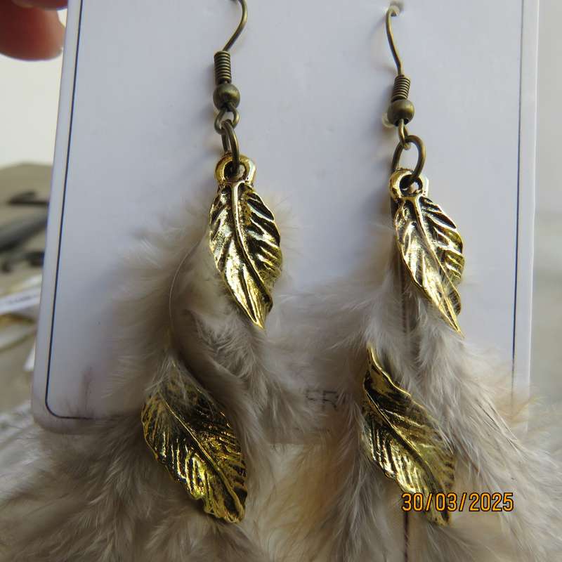 Extra long brownish feather and gold ethnic earrings. New item.
