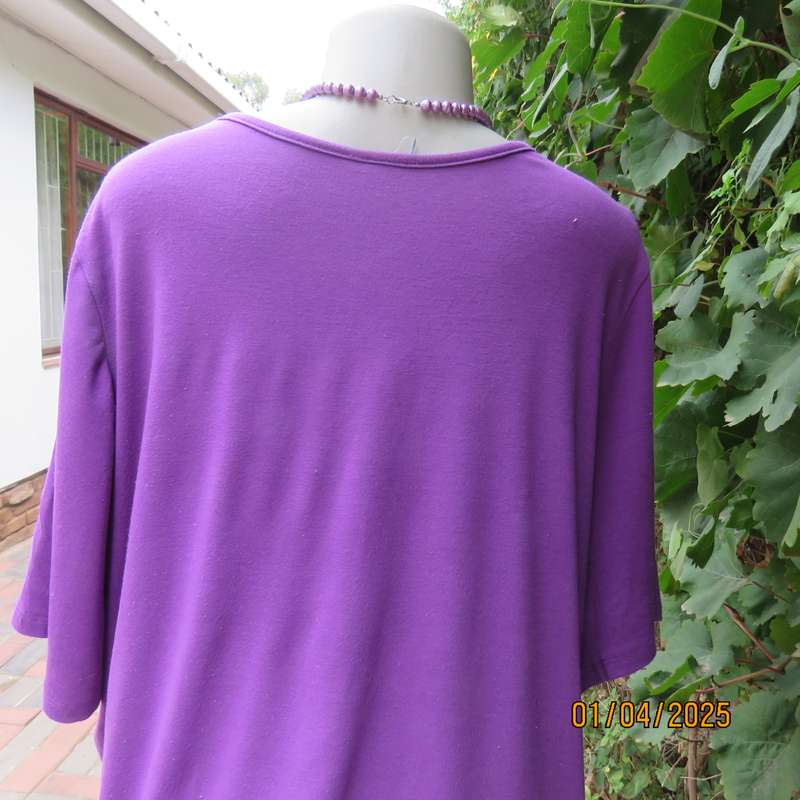 Purple slip over poly-viscose stretch short sleeve top. Size 46 to 46. With peephole.