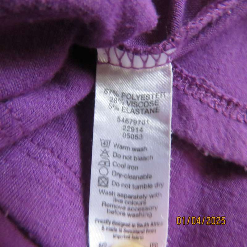 Purple slip over poly-viscose stretch short sleeve top. Size 46 to 46. With peephole.