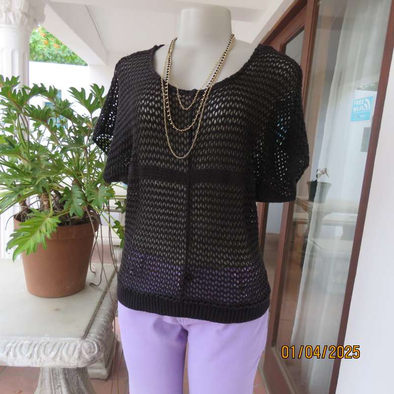 Charming black cotton knit slip over top with tiny knit-on sleeves. Size 36.