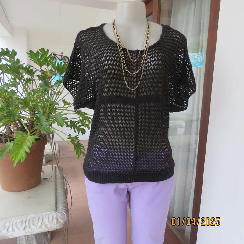 Charming black cotton knit slip over top with tiny knit-on sleeves. Size 36.