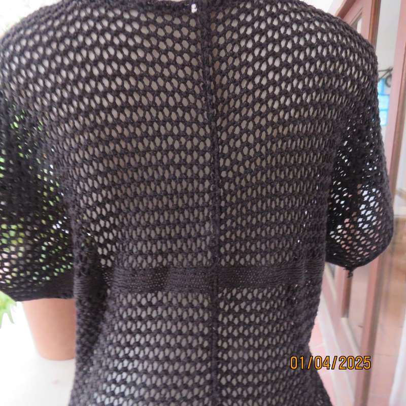 Charming black cotton knit slip over top with tiny knit-on sleeves. Size 36.