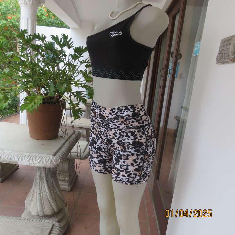 TS animal print size 32 polyester-lycra stretch sport shorts. As new.