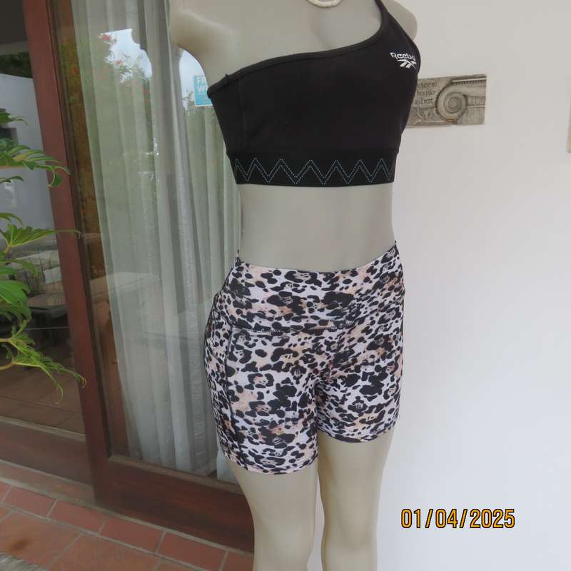 TS animal print size 32 polyester-lycra stretch sport shorts. As new.