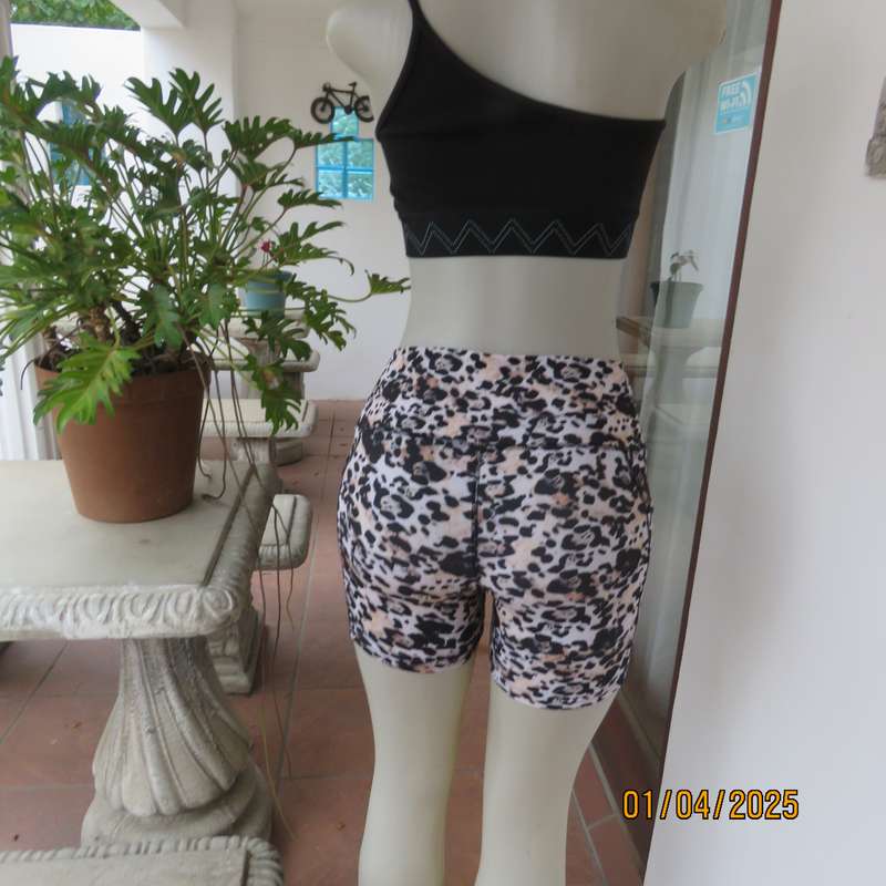 TS animal print size 32 polyester-lycra stretch sport shorts. As new.