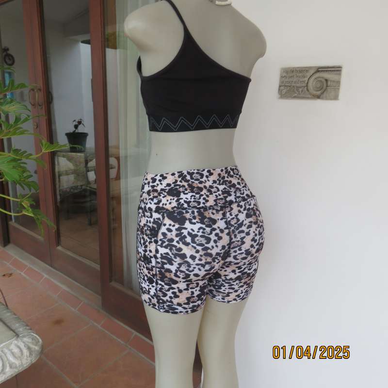 TS animal print size 32 polyester-lycra stretch sport shorts. As new.