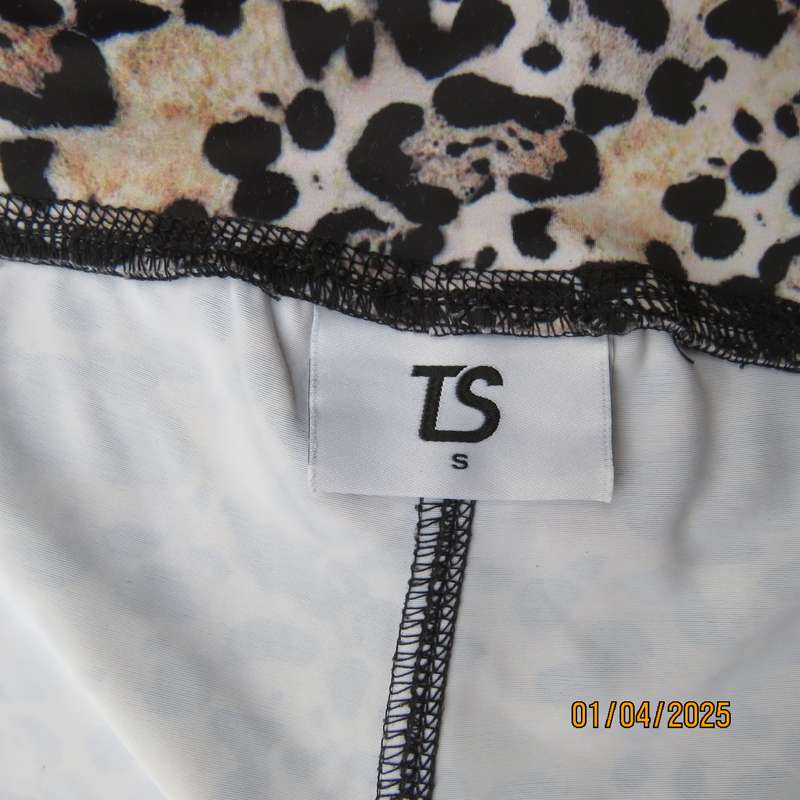 TS animal print size 32 polyester-lycra stretch sport shorts. As new.