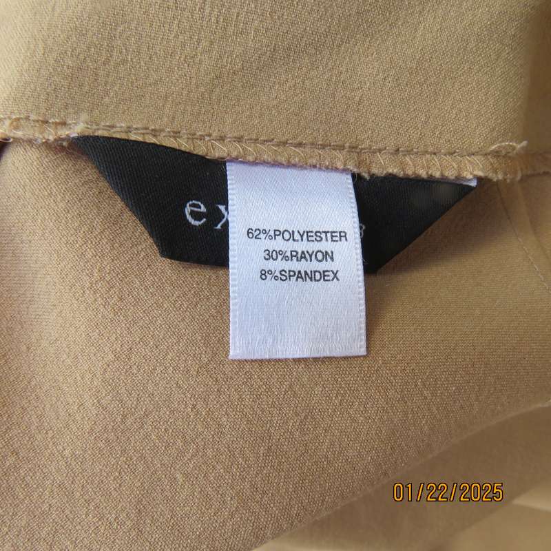 EXACT camel sleek ankle length bandless skirt in polyester-rayon stretch fabric. Size 34.As new cond