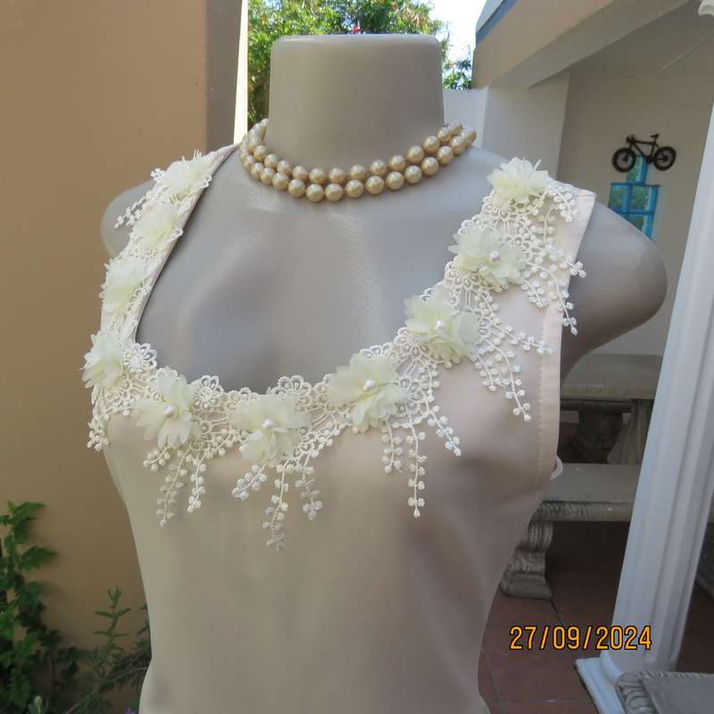 MISS L amazing rich cream shiny polyester sleeveless dress. Luxury lace deco. on neckline.Size 36